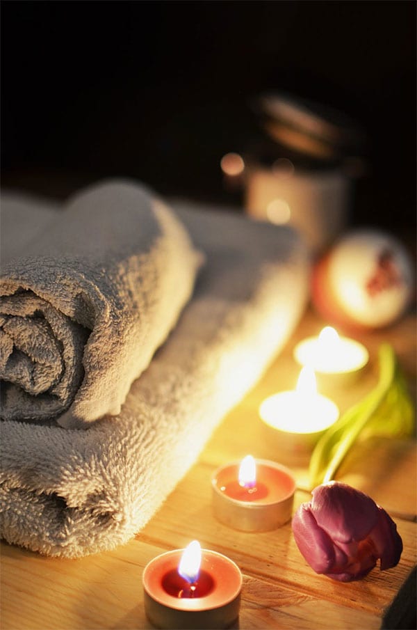 lighting a candle bliss retreat