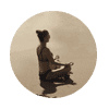Girl meditating on beach